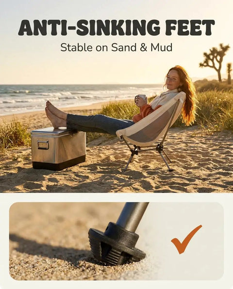 Woman on Capy OG Low Back Camping Chair With Tri Lock Stability at beach, anti-sinking feet close-up