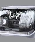 Top Notch Compact Countertop Dishwasher Fits Right Into Any Kitchen Scrubbing Dishes Clean Hassle Free With Energy Star Rating Delay Start LED panel and crisp white exterior loaded with dishes.