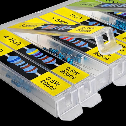 Front view: resistor assortment kit in a clear multi-compartment box with yellow labels and blue metal-film resistors.