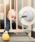 4 Pack Baby Gate Wall Protector Cups For Child Safety And Pet Gates Frosted Matte Non Slip Guards with child and gate closeup