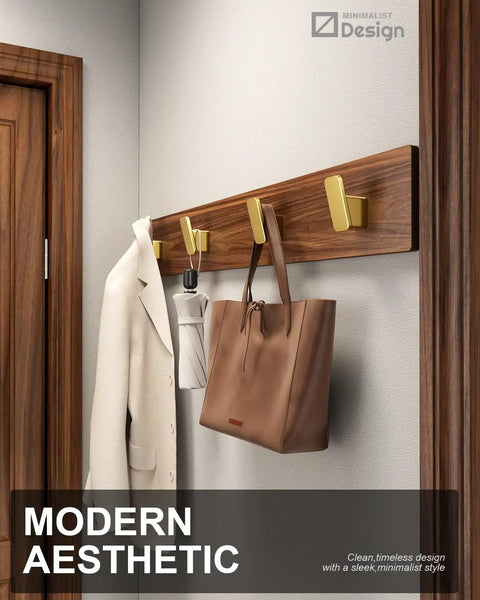 Four Pack Brushed Gold Towel Hooks For Bathroom And Mudroom Heavy Duty Wall Hangers For Towels Coats Hats Bags Belts And More Drill In Mount With Screws Rustproof Aluminum Holder Back Of Door Outdoor Use shown in entryway with hanging coat and bag