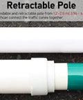 Heavy Duty Street Smart Ten Piece Retractable Traffic Cone Bar Extending Four To Seven Feet Dead Nuts Reliable For Road Construction Sites Loading Docks And Crowd Control Zones With Bright Reflective Strips, close-up of extendable pole.