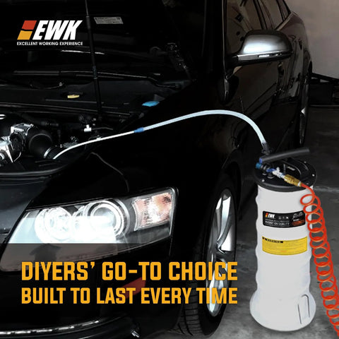 EWK 6.5L oil extractor pump for automotive fluids with white tank and orange coiled hose, front view.