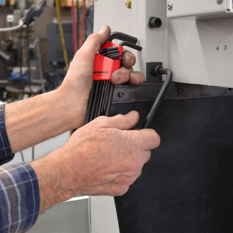 Hands using Long Reach Hex Key Set 9 Piece Allen Wrench Kit 1.5mm to 10mm for tight spots fastening metal equipment