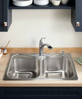 Forté Single-Hole Kitchen Faucet With 9-1/16 Inch Spout in polished chrome on dual sink