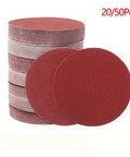 Premium 5 Inch Hook And Loop Sanding Discs With Durable Aluminum Oxide abrasive For Heavy Duty Wood Metal Work In 60 To 1000 Grits stacked in a pile.