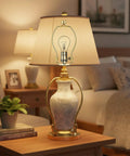 Rock Solid 2 Pack Short Lamp Harp 6 Inch Antique Gold Shade Bracket on stylish table lamp with ceramic base.