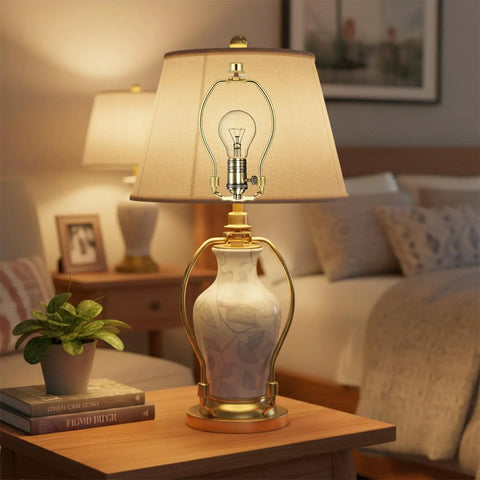 Rock Solid 2 Pack Short Lamp Harp 6 Inch Antique Gold Shade Bracket on stylish table lamp with ceramic base.