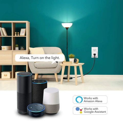 Living room scene with Smart Plug Mini 15A WiFi Outlet Works With Alexa And Google Assistant, lamp, sofa, and smart speakers.