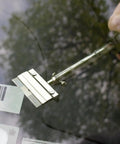 Long Handle Adhesive And Vinyl Decal Remover With Razor Blade Scraper peeling off decal from car window