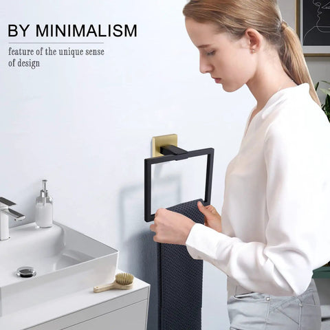 Woman installing Dope Black And Gold Stainless Steel Towel Ring Wall Mount Square Hand Towel Holder For Bathroom Rust Resistant
