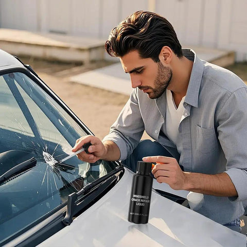 Man using Windshield Crack Repair Kit For Cars Upgraded 2026 Quick Fix Glass Repair Fluid Kit on vehicle windshield chip.