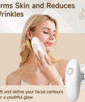 Woman using Three In One At Home Body Sculptor With Suction Massage And Red Light Therapy for facial skin care
