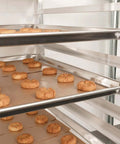 Pro Grade Aluminum Baking Sheet Pan For Oven 18 Inch Long By 26 Inch Wide By 1 Inch Deep Cookie Sheet 12 Pack with cookies