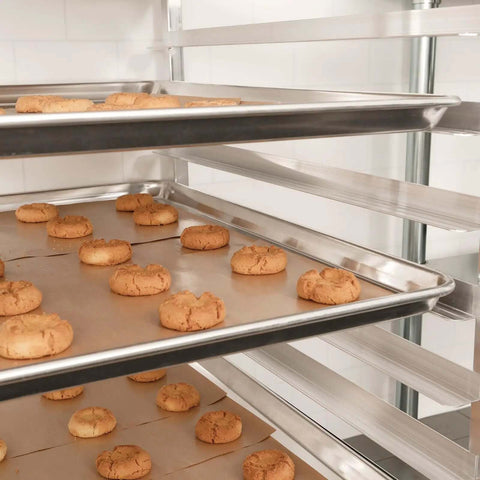 Pro Grade Aluminum Baking Sheet Pan For Oven 18 Inch Long By 26 Inch Wide By 1 Inch Deep Cookie Sheet 12 Pack with cookies