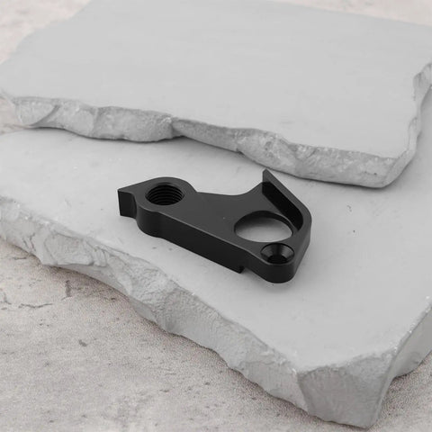 Derailleur Hanger GP0252-01 EP0920-01 Direct Replacement For Canyon Aeroad CF SL Disc, aluminum bike part on stone surface