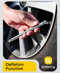 Installed pencil-style tire pressure gauge with stainless steel body on car tire valve; deflation function