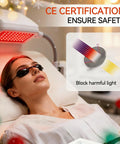 Front view of black protective red-light therapy goggles on a woman during tanning bed session; adjustable arms.