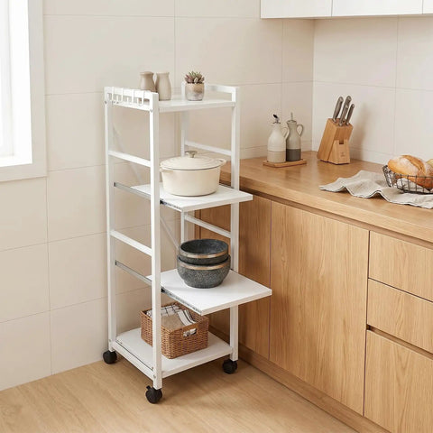 White 4 Tier Rolling Kitchen Cart With Pull Out Shelf Adjustable Middle Racks And Secure Locking Wheels Microwave Stand in kitchen with cookware.