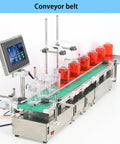 Compact Automatic Liquid Filling Machine With Conveyor Belt And Smart Dual Nozzles For Smooth Bottling Perfumes Spirits Cooking Oil No Sweat Digital Calibration with bottles on conveyor.
