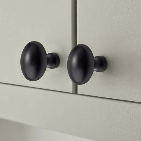 Matte Black Cabinet Knobs 10 Pack Solid Zinc Alloy Handles installed on light gray kitchen cupboards