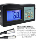 Hella Reliable Digital Vibration Meter Gauge And Analyzer For Heavy Industrial Machinery handheld device showing measurement values and functions.