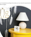 Adjustable Lampshade Harp Holder Kit with white lampshade on yellow table, sturdy golden finish, ideal DIY lighting upgrade