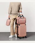 Amazon Basics 3-Piece Luggage Set rose gold: 22-inch hardside suitcase with 8-wheel, plus 15-inch tote and 10-inch bag.