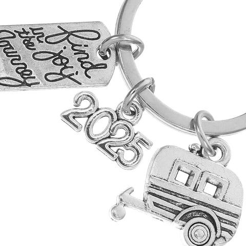 Must Have Travel Themed Keychain In Silver Zinc Alloy With Sturdy Build And Easy Clip Attach showing camper and 2025 charms
