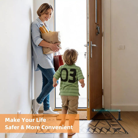 Adjustable Magnetic Door Stop Built Tough With Strong Magnetic Hold Stainless Steel Black Door Stop Wall Or Floor Mount Extends 3.15 To 4.8 Inches For A Perfect Fit And Easy Grip in use by a mom holding groceries and child entering through a door.