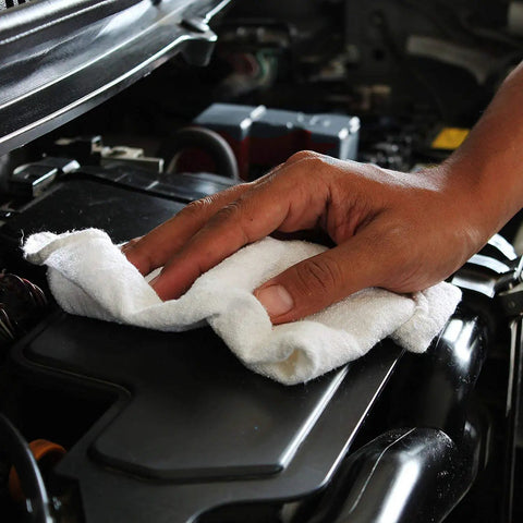 Cotton Shop Towels 14 By 12 Inches 145 Pack Reusable Cleaning Rags For Automotive Garage Workshop And Industrial Use White Durable Absorbent Lint Free Quick Clean Up Workhorse Towels being used to wipe a car engine.