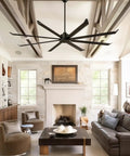 Massive 100 Inch Industrial Ceiling Fan Moves Serious Air Pmsm Motor With 8 Double Layer Aluminum Blades 21000 Cfm High Airflow in a stylish living room.