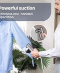 Person using Magic 1 Vacuum Steamer For Clothes With 2300Pa Fabric Grip One Handed Operation On The Go Handheld Garment Steamer on shirt