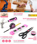 Pink 136 Piece Cordless Tool Set With 3.6V USB Electric Screwdriver displayed with hammer, tape measure, level, scissors on table.