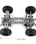 Top view of DIY Four Wheel Drive RC Car Chassis Kit With Independent Suspension System, showing differential gear and wheels.