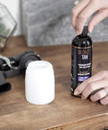 Replacement Gun For HVLP Spray Tan Machine With 200ml Cup And Adjustable Flow For DHA Solution on a wooden table