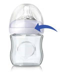 No Drama Replacement Screw Ring Collar For Natural Baby Bottles Flawless Fit PP Or Glass Quick Change BPA Free Top Shelf Nursery Gear Four Pack on a glass baby bottle.