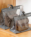Clear Dustproof Handbag Storage Organizer For Closet with two purses visible inside transparent protective pouches.