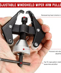 Person holding the Windshield Wiper Arm Removal Tool Kit Pro Grade Beefed Up Heavy Duty Battery Terminal Puller And Windscreen Arm Bearing Remover Adjustable Wiper Arms for Cars Trucks SUVs Repair Tools.