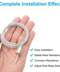Ceiling Hanging Wire Cable Kit 4 Pack With 2m Adjustable Suspension Cables held in hand, showing chrome nickel finish.