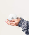 Portable Space Heater With Detachable Hand Warmer in hand, 6 x 6 x 5 inches, compact white design for small spaces