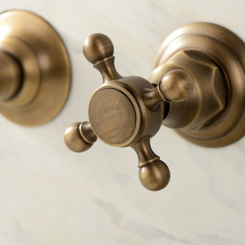 Antique Brass Bathroom Sink Faucet Set With Ceramic Disc Valve, showcasing cross handle, solid brass construction, tarnish resistant