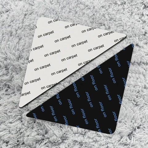 12 Piece Rug Tape Non Slip Rug End Grippers Double Sided Carpet Corner Tape Gripper Pads Non Slip Carpet Stickers For Hardwood Floors And Tiles Triangle Design For Maximum Grip showing triangle pads on carpeted surface