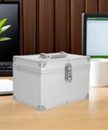 Heavy Duty Kickass Portable Aluminum Toolbox Featuring Reinforced Double Layer Storage And Secure Locks Designed Tough For Engineering Fieldwork And Jewelry Cases on a desk.