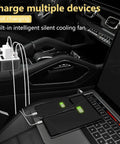 Road Tested 300W Car Power Inverter Converts 12V DC To 110V AC With No Sweat, charging multiple devices on car console.