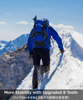 Person climbing snowy mountain with All Terrain Traction Crampons With 8 Stainless Steel Spikes for boots and shoes