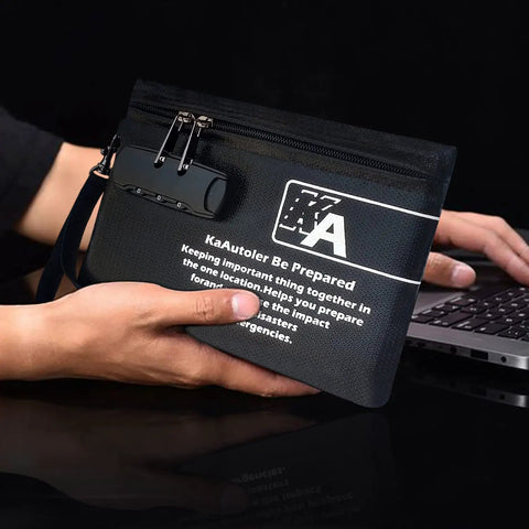 Person holding Lockable Fireproof Money Bag With Zipper Pouch near laptop, showing durable design for valuables