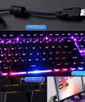 Sick RGB Backlit Mechanical Gaming Keyboard With Badass Ergonomic Form Factor And Adjustable Angle Stand, Tight USB Wired Setup For PC Gamers, Resilient Double Molded Keycaps Shield Spills And Wear, featuring a floating keycap design and USB connection.