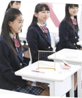 Students in a classroom with Hands On Energy Conservation Science Kit For Students With A Snake Shape Pendulum Project DIY Model.