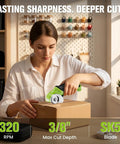 4V Cordless Electric Scissors For Cardboard Cutting With 4 Sk5 Blades Heavy Duty Power Tool For Leather And Fabric cutting through a cardboard box.